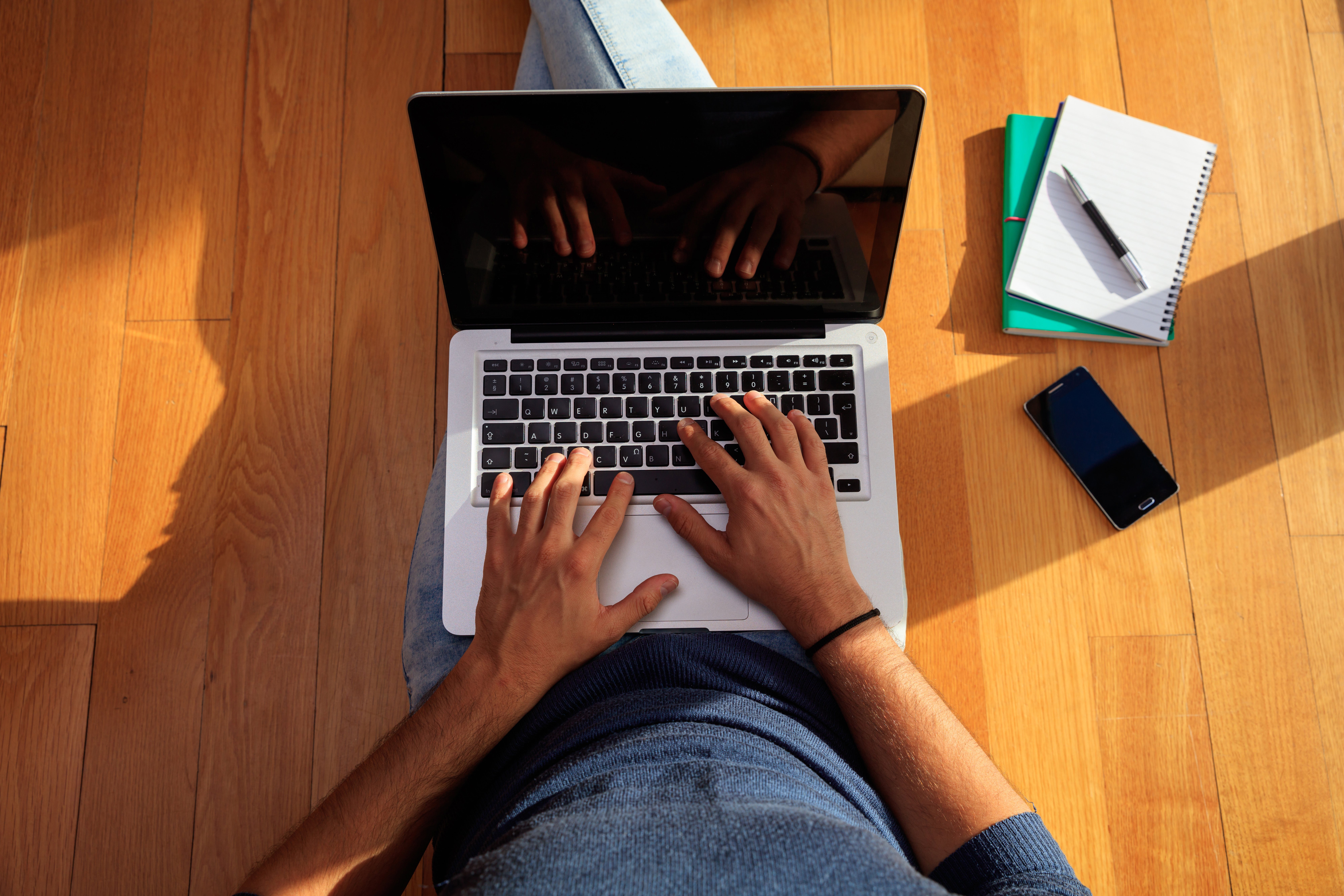 workspace-at-home-student-working-with-a-laptop-on-PBKR8DV